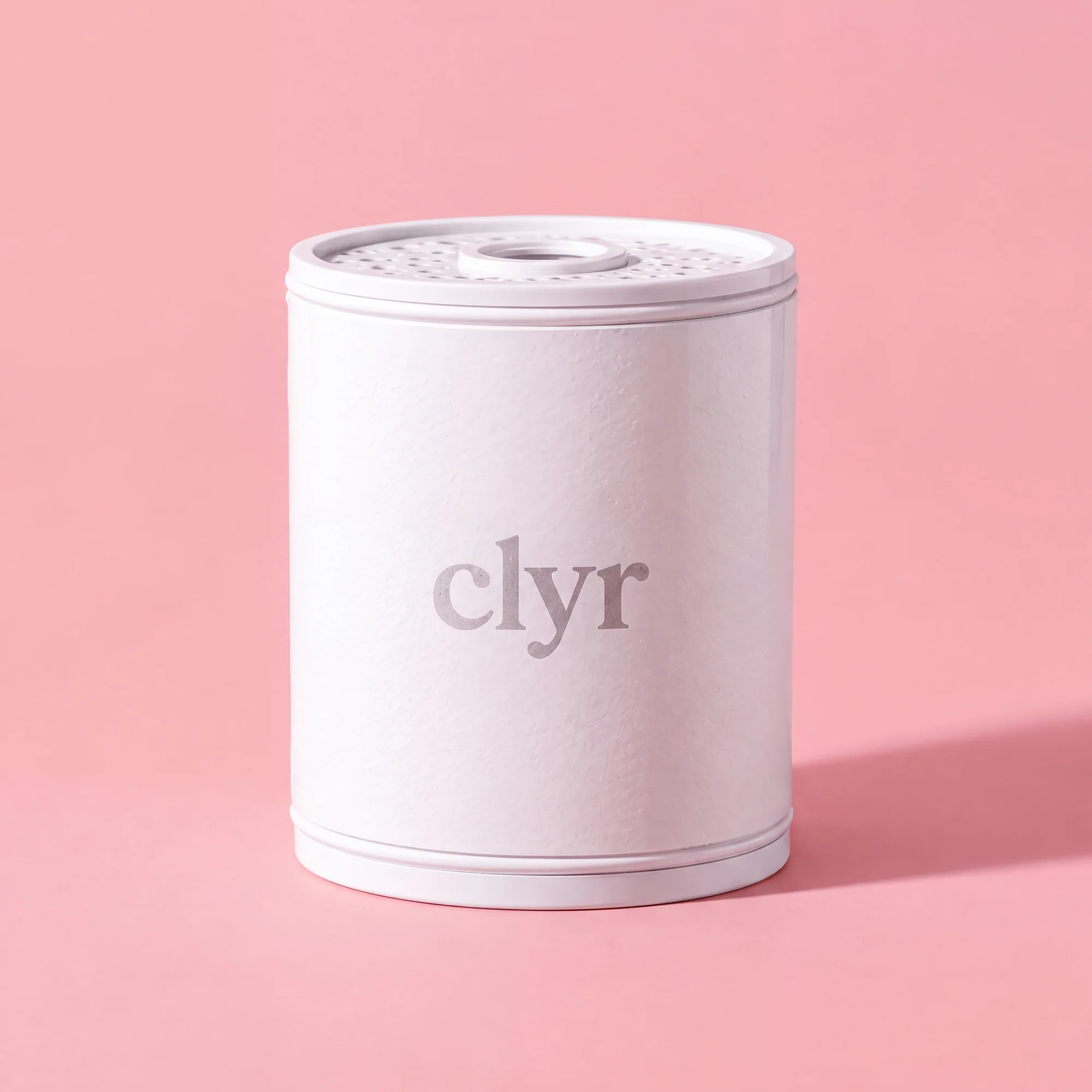 Clyr replacement-filter cartridge on a coral-pink background
