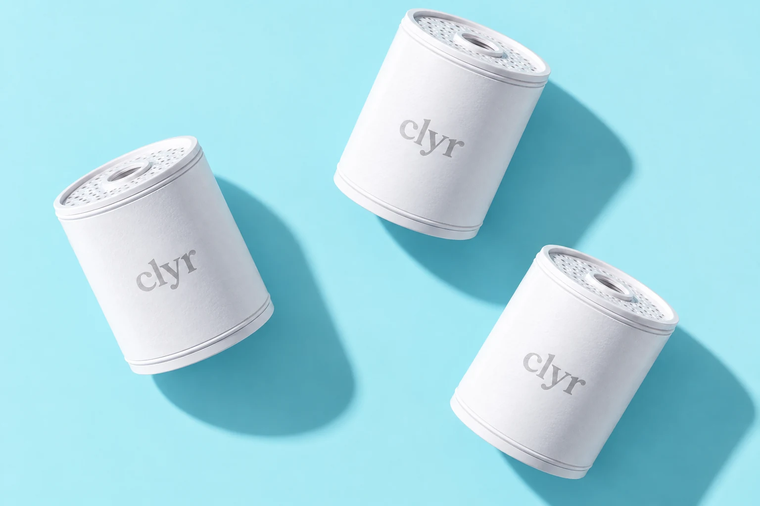 Clyr replacement-filter cartridges arranged on an aqua background